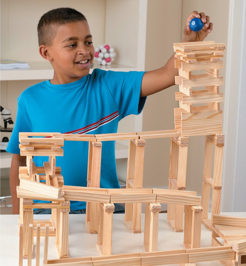 Keva Maple Stem building kit with boy and blue ball. 