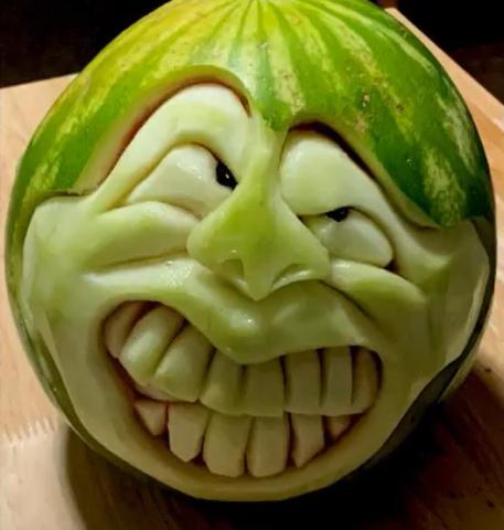 Image of a carved face on a watermelon.