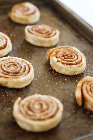 Pinwheel cookies on a cookie sheet.