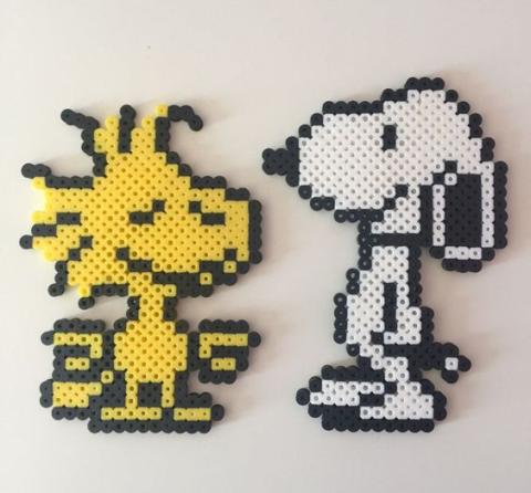 Image of Snoopy and Woodstock characters made out of Perler beads.