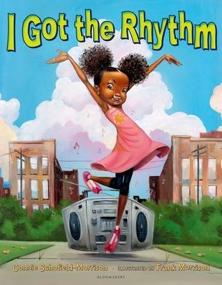 This image is the book cover of 'U Got The Rhythm" and features A vibrant illustration of a joyful young girl dancing with a boombox, set against a city background with buildings, trees, and a bright blue sky