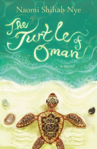 This image is the book cover of The Turtle of Oman by Naomi Shihab Nye. It features a stylized sea turtle with intricate patterns on its shell and limbs, lying on a sandy shore near the ocean. The title is written in an elegant, flowing script at the top, with the author's name above it. The background transitions from sandy beach to greenish-blue ocean waves.